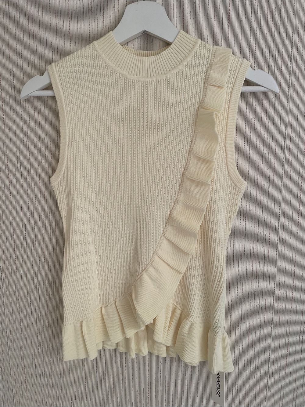 Sleeveless Cream Ruffled Knit Top